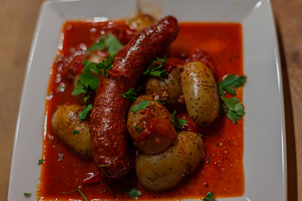 Sausage & potato bake with tangy tomato sauce