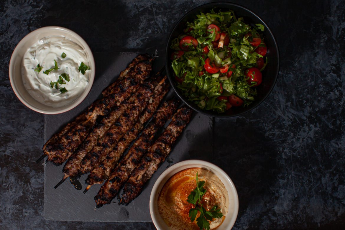 Beef kofta kebabs with cold mezze