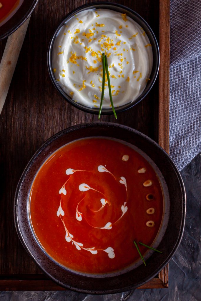 Butternut squash soup with with yogurt, pine nuts, chives and lemon