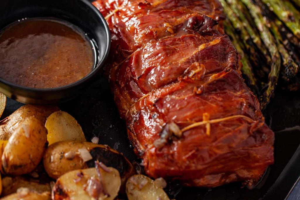 Prosciutto-Wrapped Grilled Pork Loin with Grilled Potatoes and Asparagus