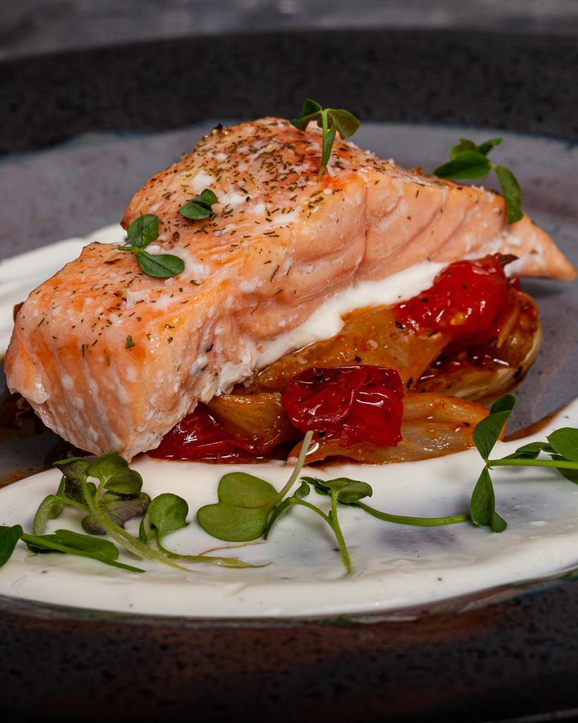 Roasted salmon with tomatoes and fennel