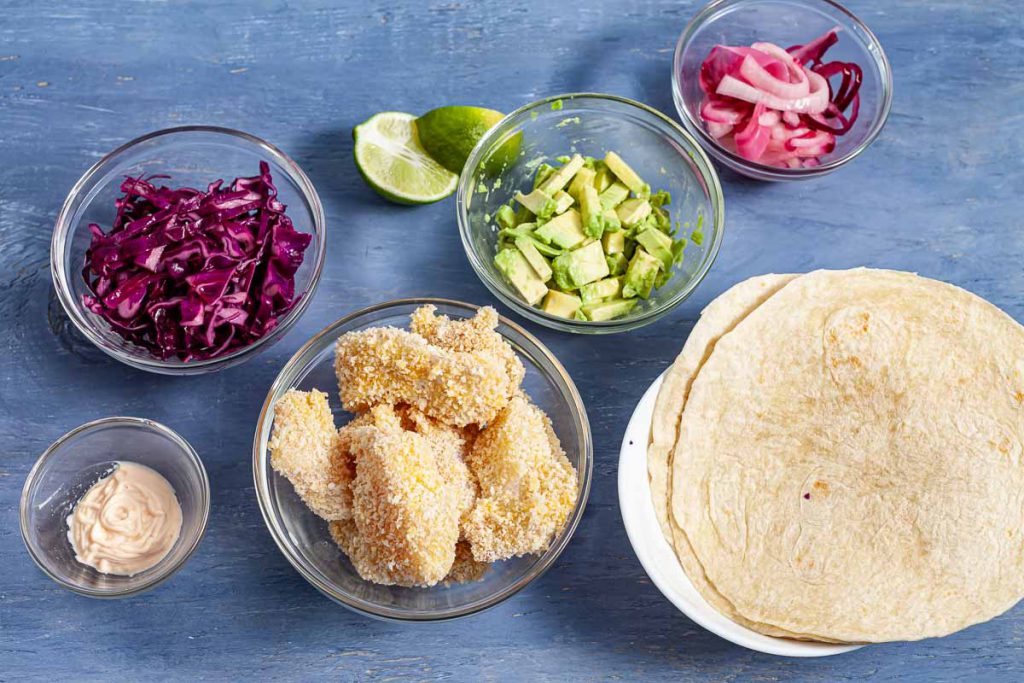 Crispy fish tacos ingredients and condiments